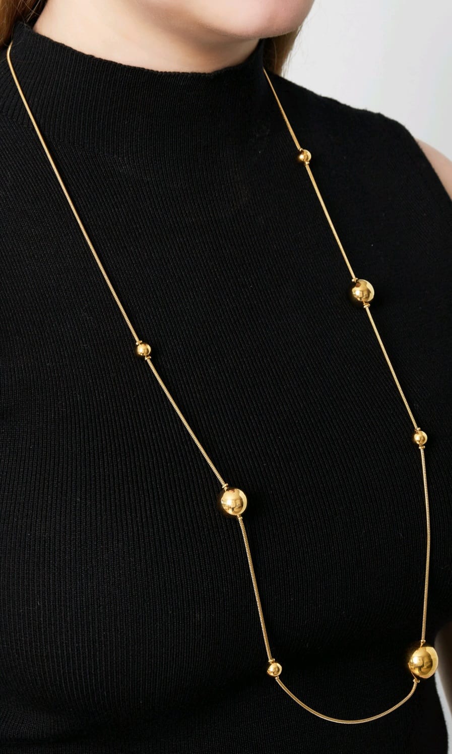 Gold beaded long necklace